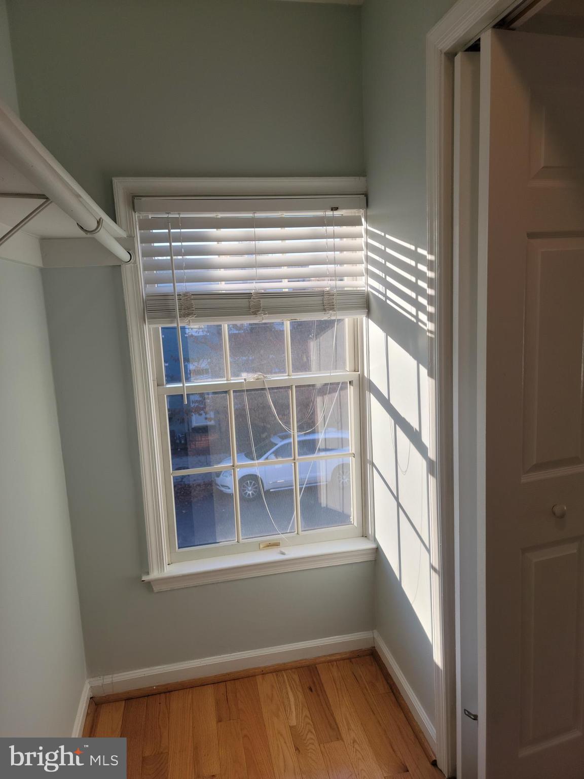 133 North Payne Street, Unit 2 Alexandria, VA 22314 - Photo 13 of 16 a view of empty room with wooden floor and fan