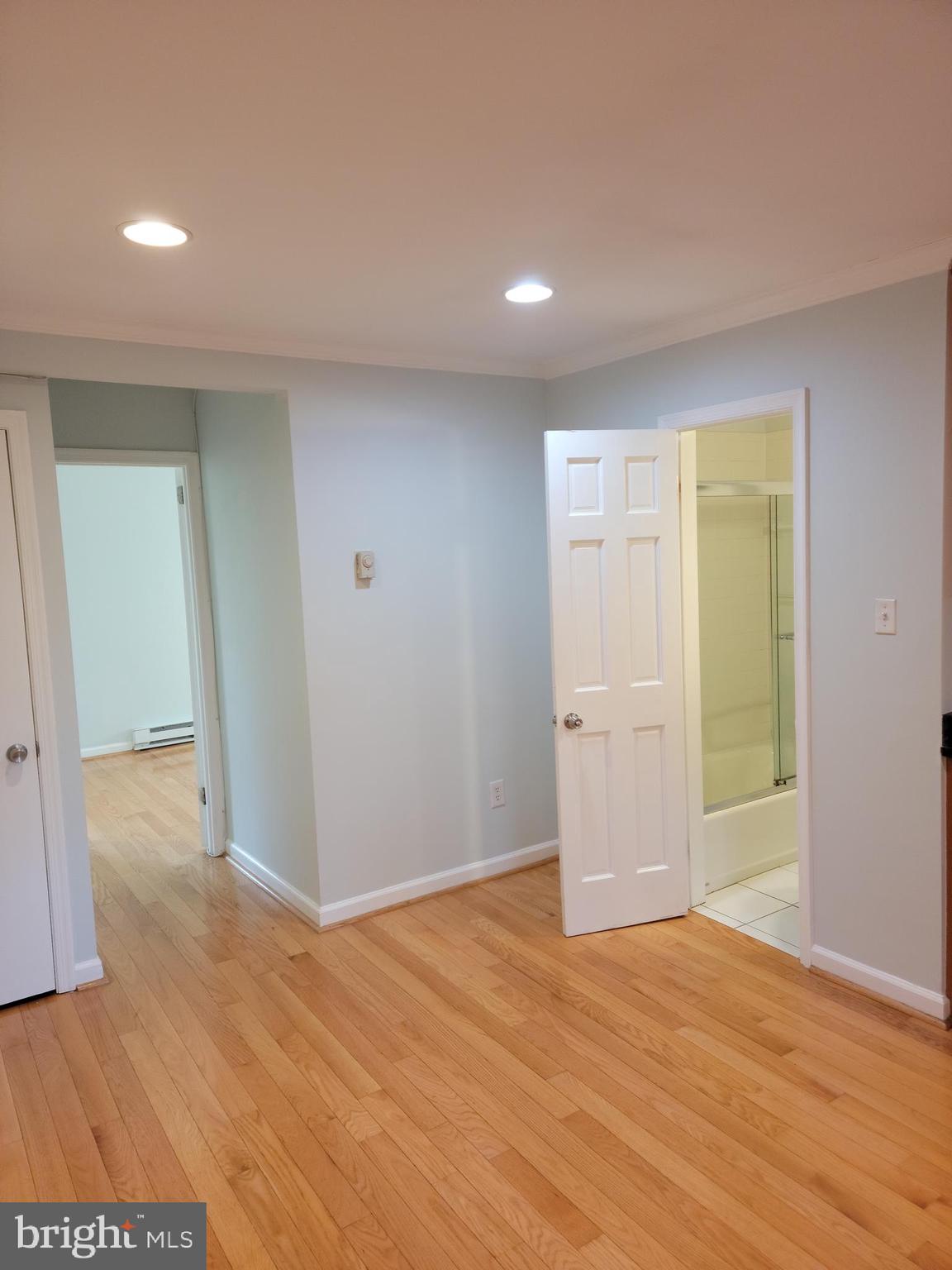 133 North Payne Street, Unit 2 Alexandria, VA 22314 - Photo 4 of 16 a view of empty room with wooden floor