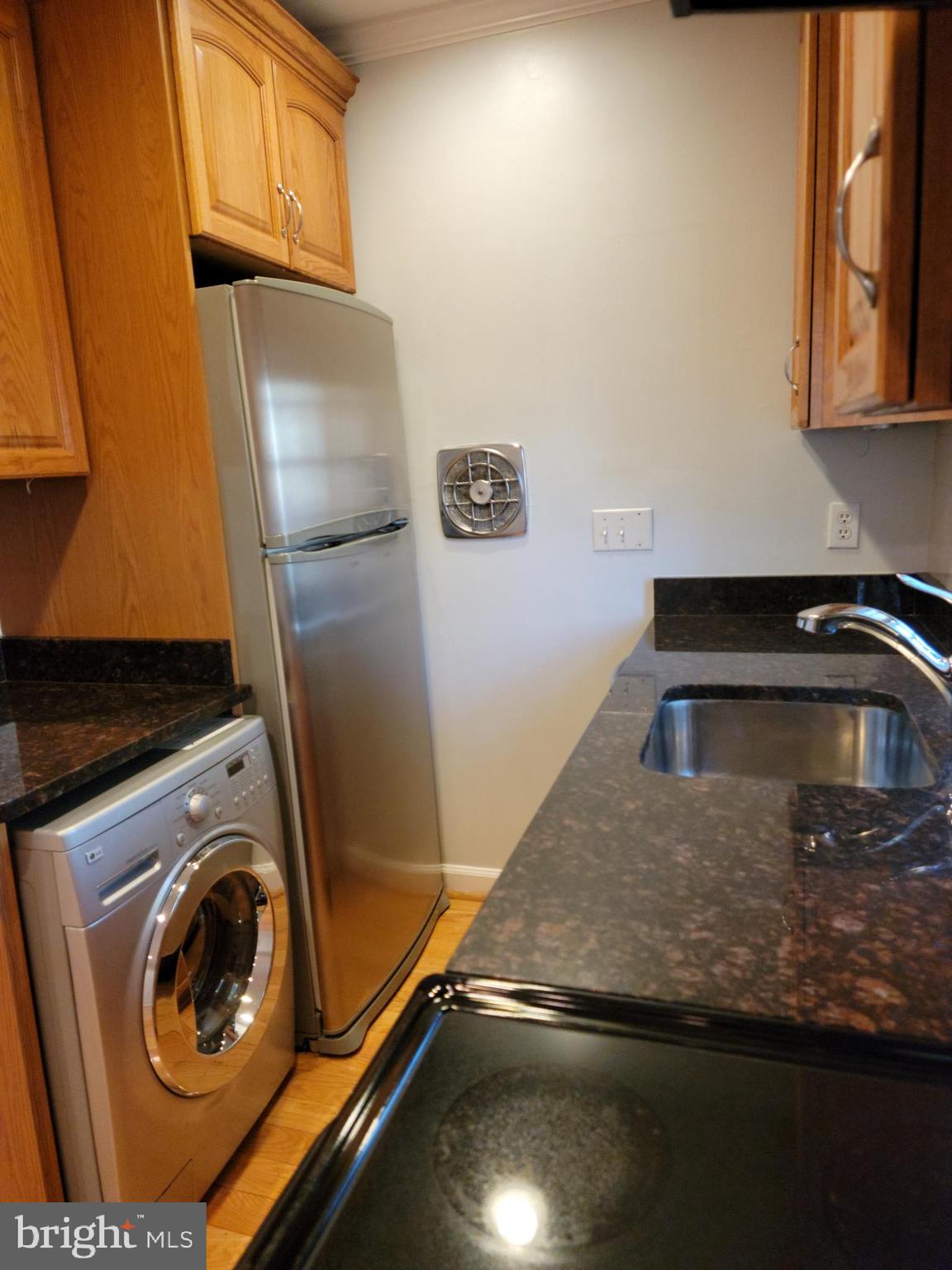 133 North Payne Street, Unit 2 Alexandria, VA 22314 - Photo 9 of 16 a utility room with dryer and washer