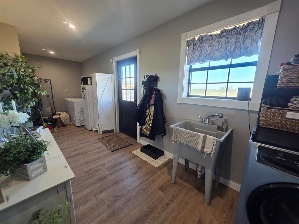 1225 R R G Loop Olney, TX 76374 - Photo 20 of 40 a view of a livingroom with furniture and a window