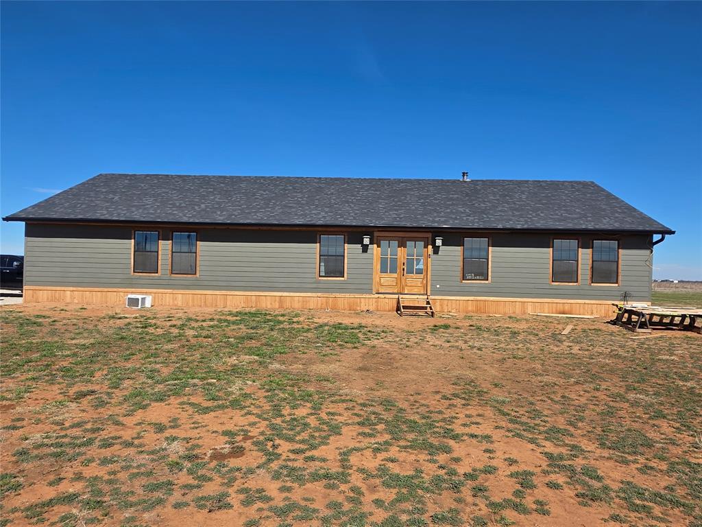 1225 R R G Loop Olney, TX 76374 - Photo 2 of 40 a front view of a house with a yard