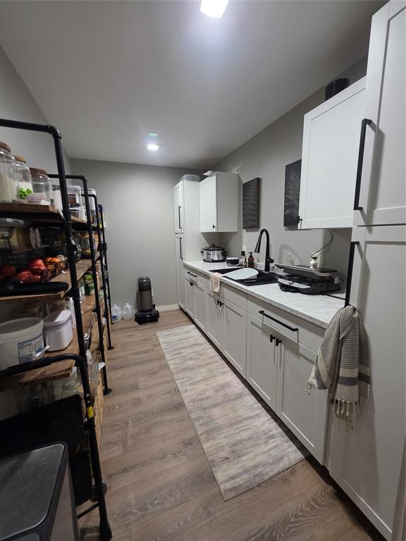 1225 R R G Loop Olney, TX 76374 - Photo 22 of 40 a kitchen with appliances cabinets and furniture