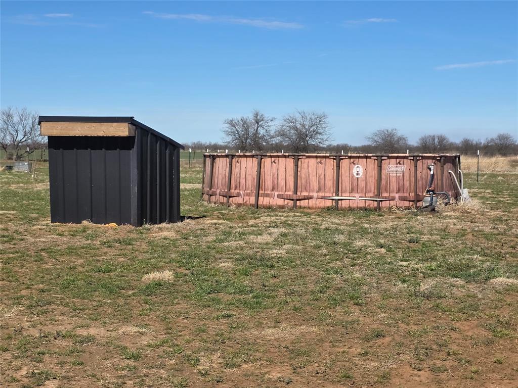 1225 R R G Loop Olney, TX 76374 - Photo 30 of 40 a view of a backyard of the house