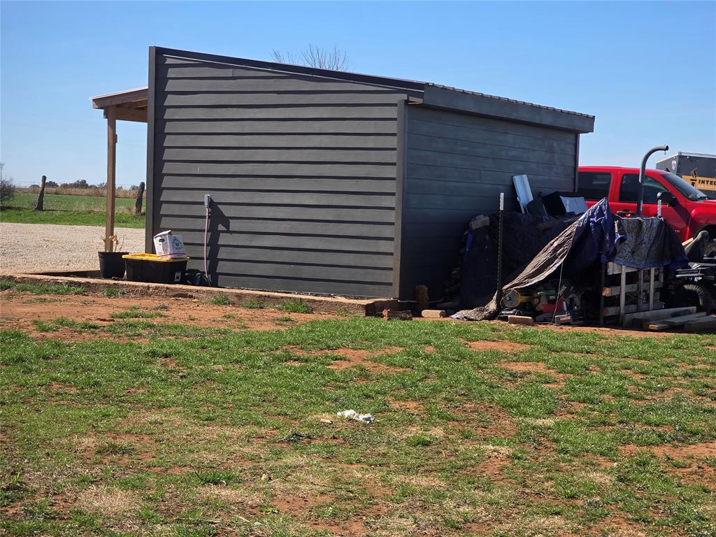1225 R R G Loop Olney, TX 76374 - Photo 32 of 40 a view of a house with a backyard