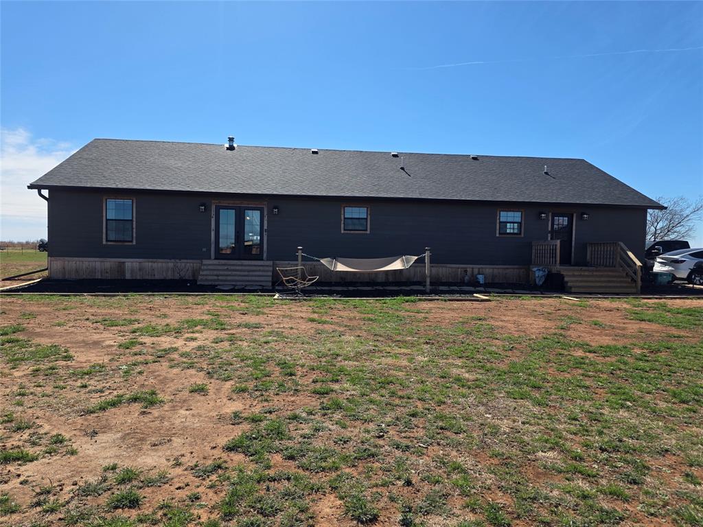 1225 R R G Loop Olney, TX 76374 - Photo 33 of 40 a front view of a house with a yard