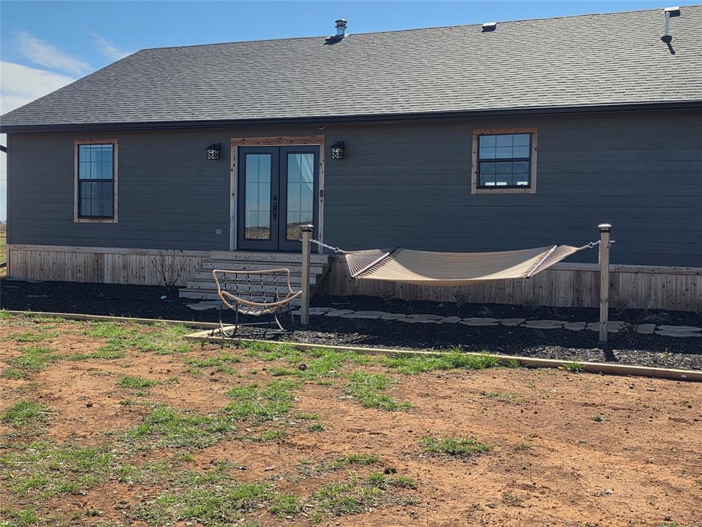 1225 R R G Loop Olney, TX 76374 - Photo 34 of 40 a backyard of a house