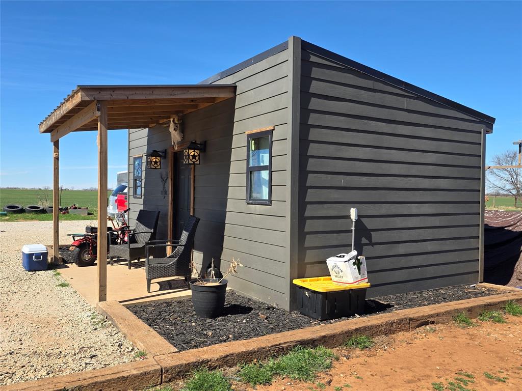 1225 R R G Loop Olney, TX 76374 - Photo 36 of 40 a view of a lounge chairs in the patio