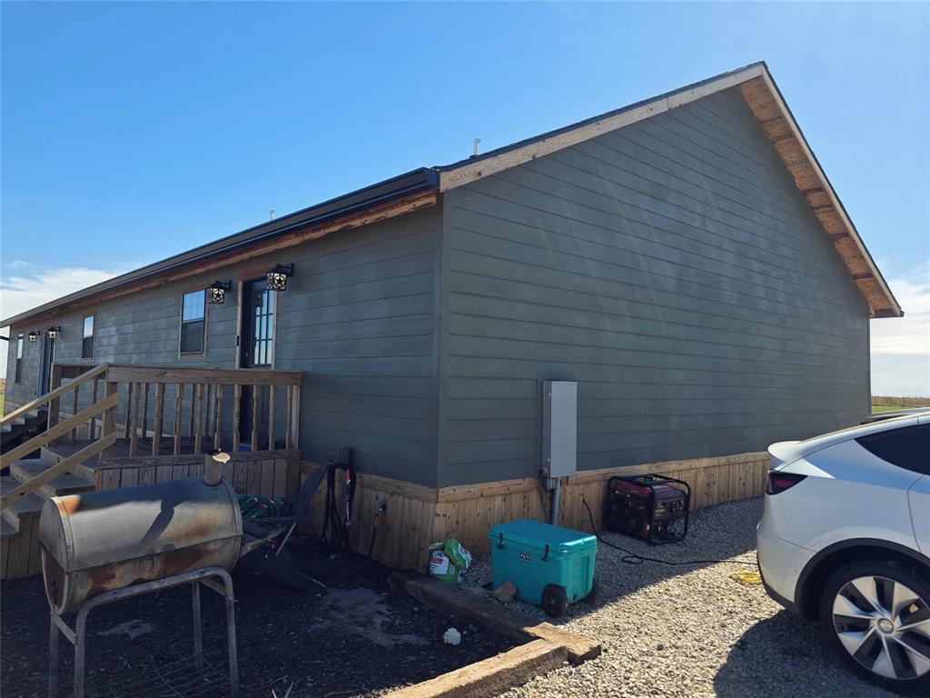 1225 R R G Loop Olney, TX 76374 - Photo 38 of 40 a backyard of a house with seating space