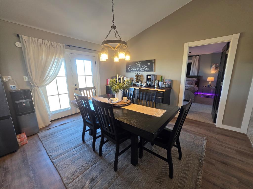 1225 R R G Loop Olney, TX 76374 - Photo 4 of 40 a view of a dining room with furniture window and wooden floor