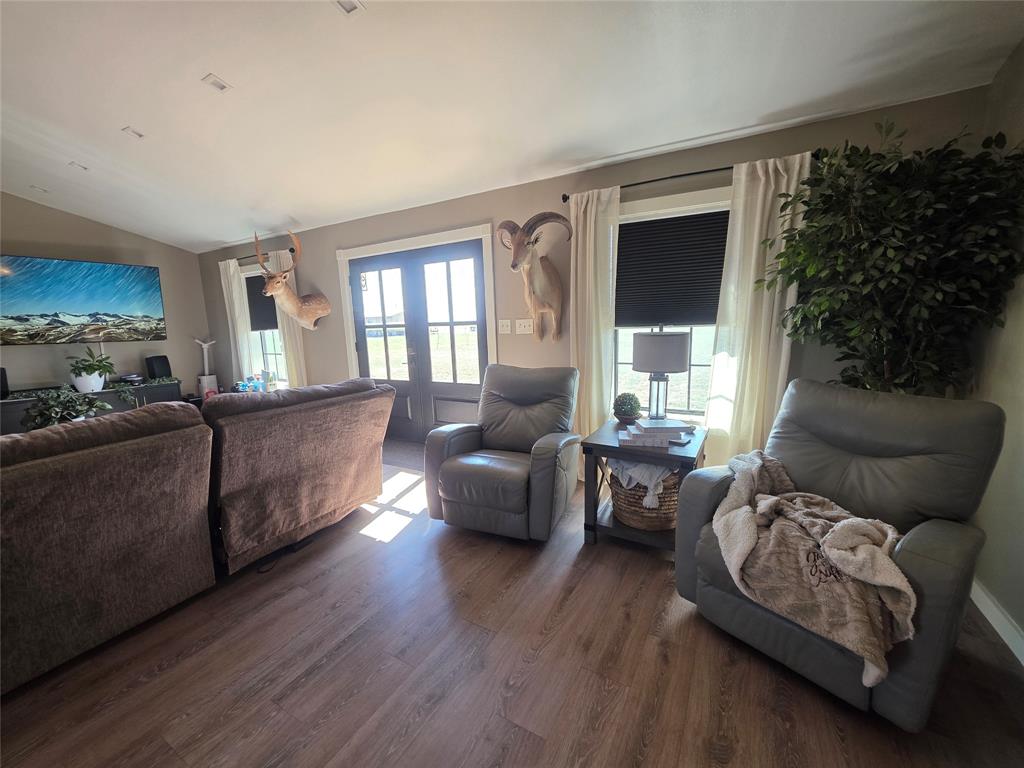 1225 R R G Loop Olney, TX 76374 - Photo 8 of 40 a living room with furniture and a large window