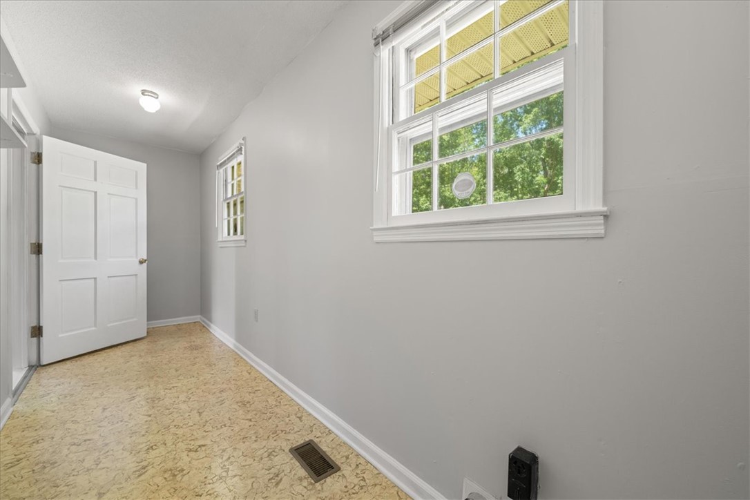 304 Shaw Road Honea Path, SC 29654 - Photo 27 of 39 This bright space features ample natural light, ideal for a flexible-use area.