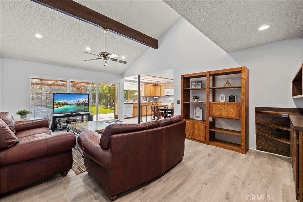 28784 Eagleton Street Agoura Hills, CA 91301 - Photo 11 of 48 a living room with furniture flat screen tv and outdoor view