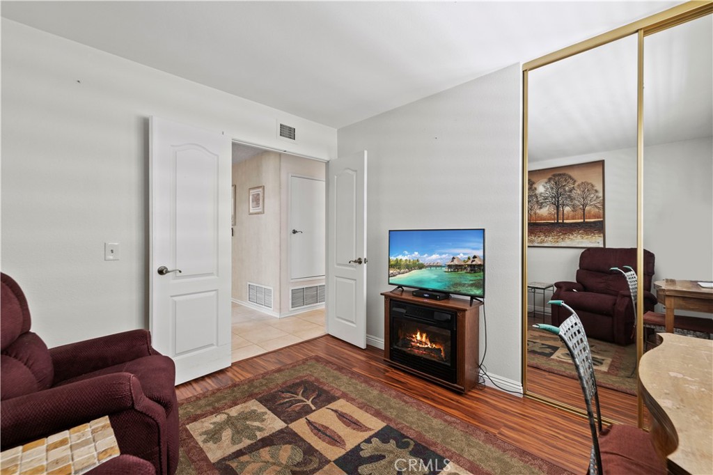 28784 Eagleton Street Agoura Hills, CA 91301 - Photo 28 of 48 a living room with furniture and a fireplace