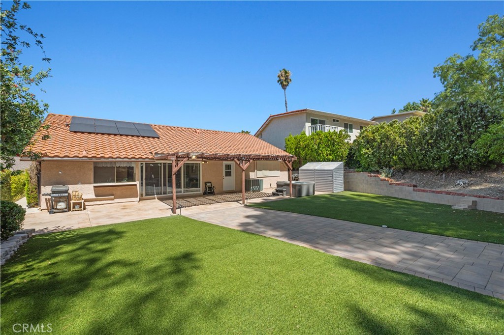 28784 Eagleton Street Agoura Hills, CA 91301 - Photo 42 of 48 a house view with a sitting space and garden