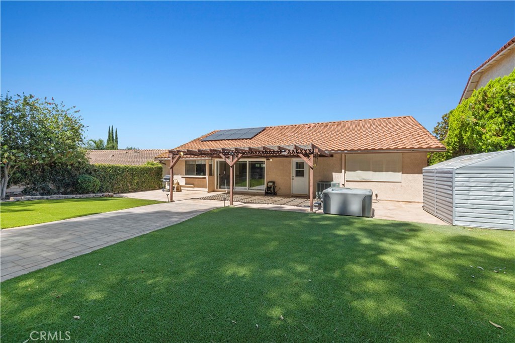 28784 Eagleton Street Agoura Hills, CA 91301 - Photo 43 of 48 a front view of a house with swimming pool having outdoor seating