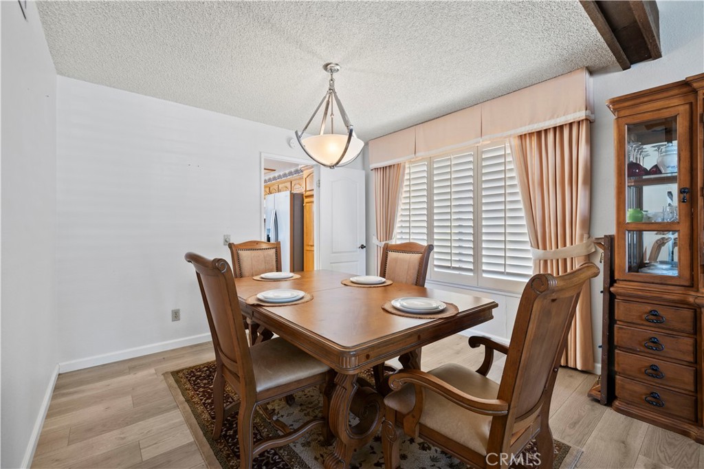 28784 Eagleton Street Agoura Hills, CA 91301 - Photo 8 of 48 a view of a dining room with furniture and window