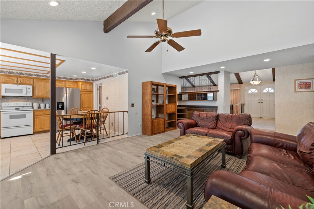 28784 Eagleton Street Agoura Hills, CA 91301 - Photo 10 of 48 a living room with furniture and kitchen view