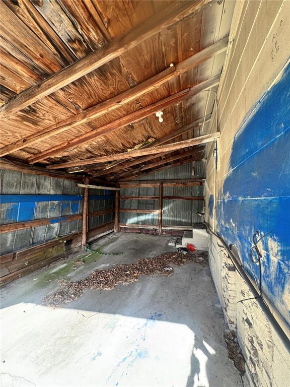 537 Rutherford Avenue Macon, GA 31206 - Photo 8 of 10 a view of a garage with wooden wall