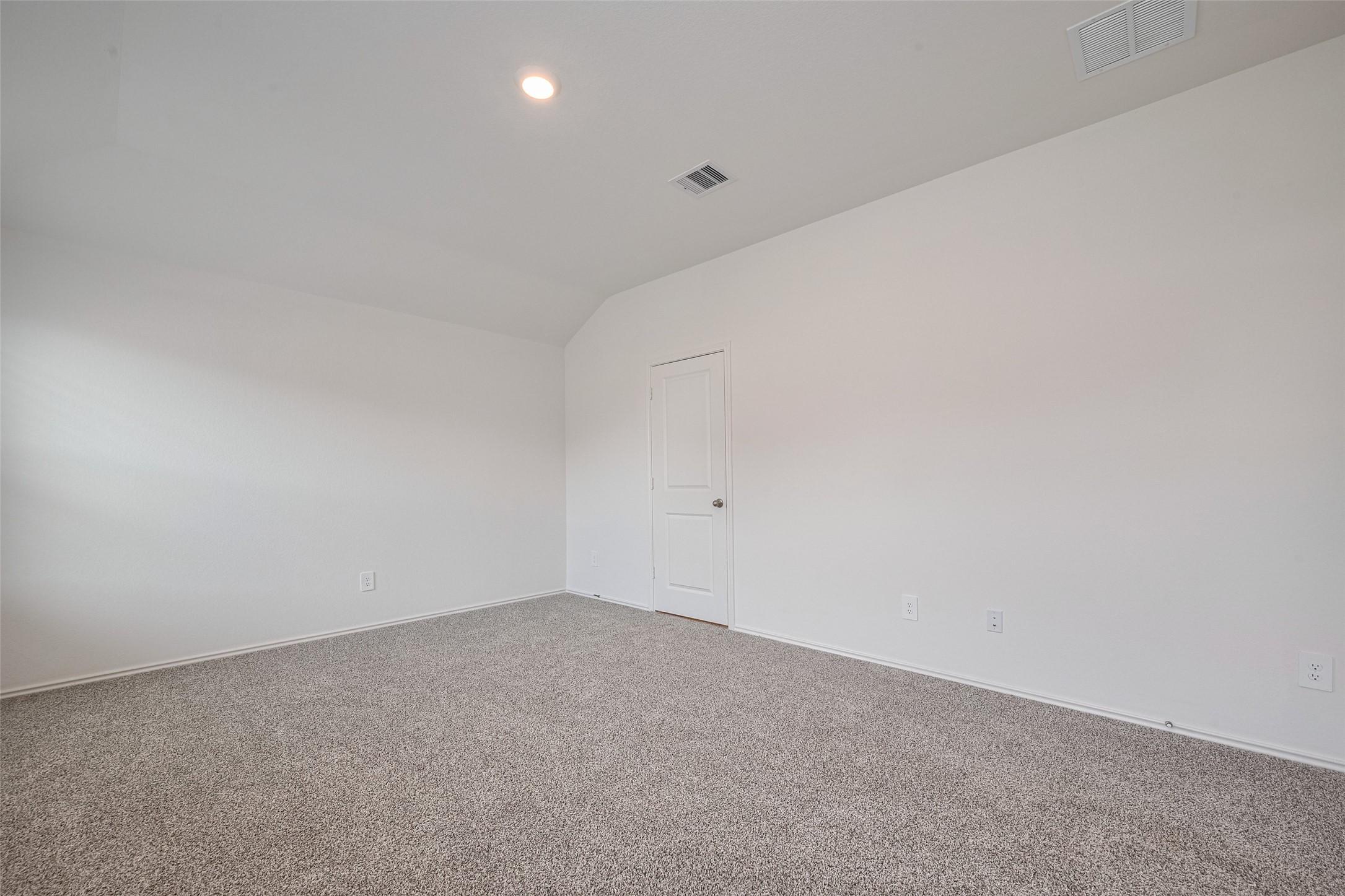 30842 Brightwell Bend Fulshear, TX 77441 - Photo 25 of 31 Spacious and bright bedroom with plush carpet and neutral walls, ready for your personal touch