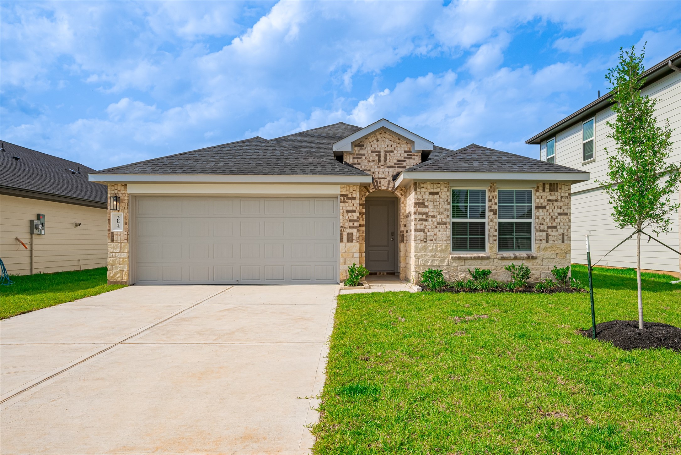 30842 Brightwell Bend Fulshear, TX 77441 - Photo 31 of 31 Charming brick and stone elevation with great curb appeal! This single-story home features a two-car garage, covered entryway, and fresh landscaping on a spacious lot