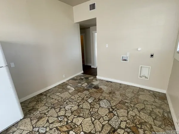 an empty room with a natural light