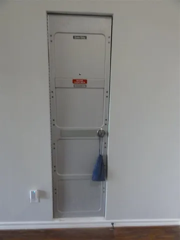 a bathroom with a shower and a toilet