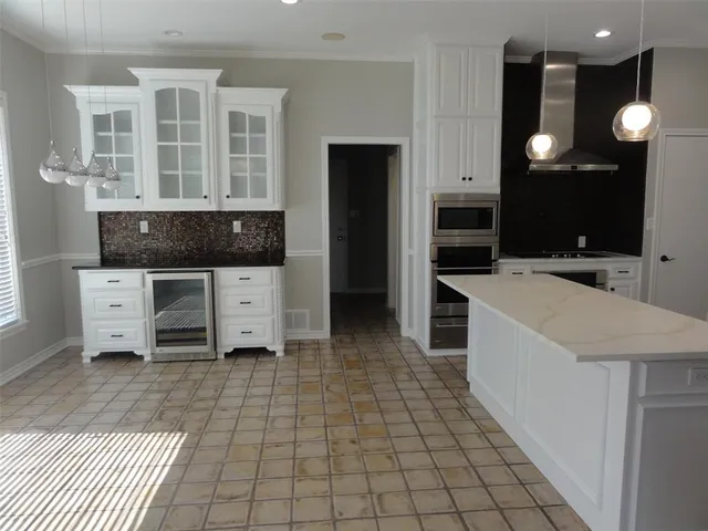 a view of washer and dryer with wooden floor