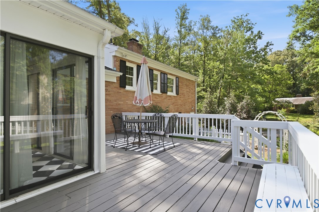 6405 Buckhill Road Richmond, VA 23225 - Photo 43 of 71 Spacious outdoor deck with a painted wooden surfac