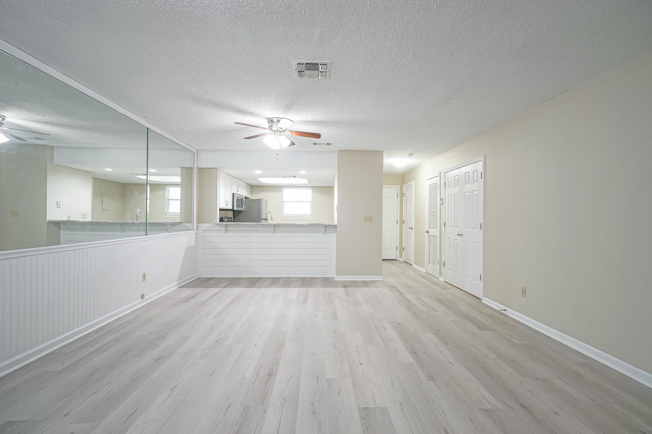 16 Court Drive Destin, FL 32541 - Photo 13 of 50 a view of a kitchen with wooden floor and window