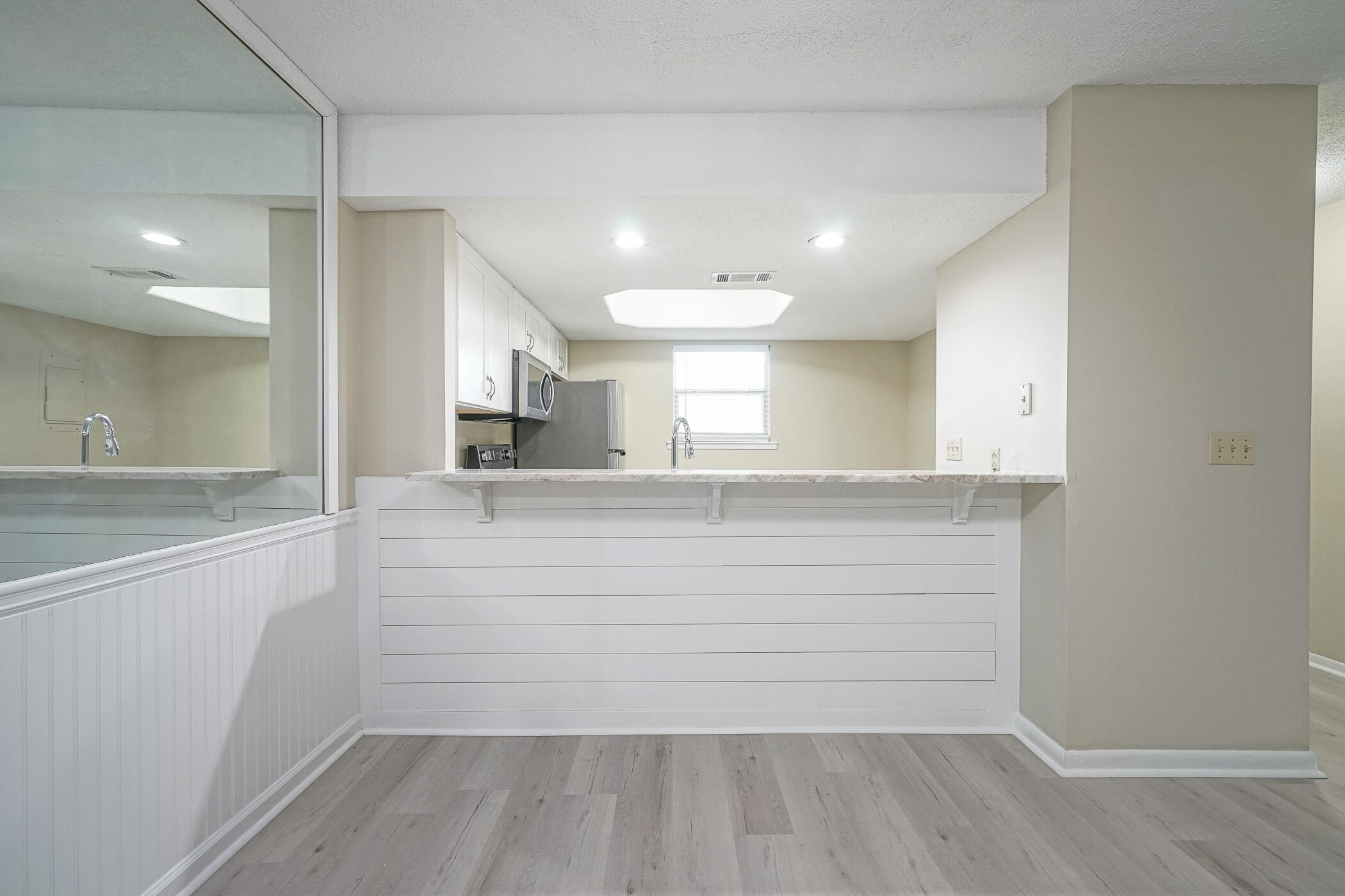 16 Court Drive Destin, FL 32541 - Photo 14 of 50 a view of a kitchen with a sink and cabinets