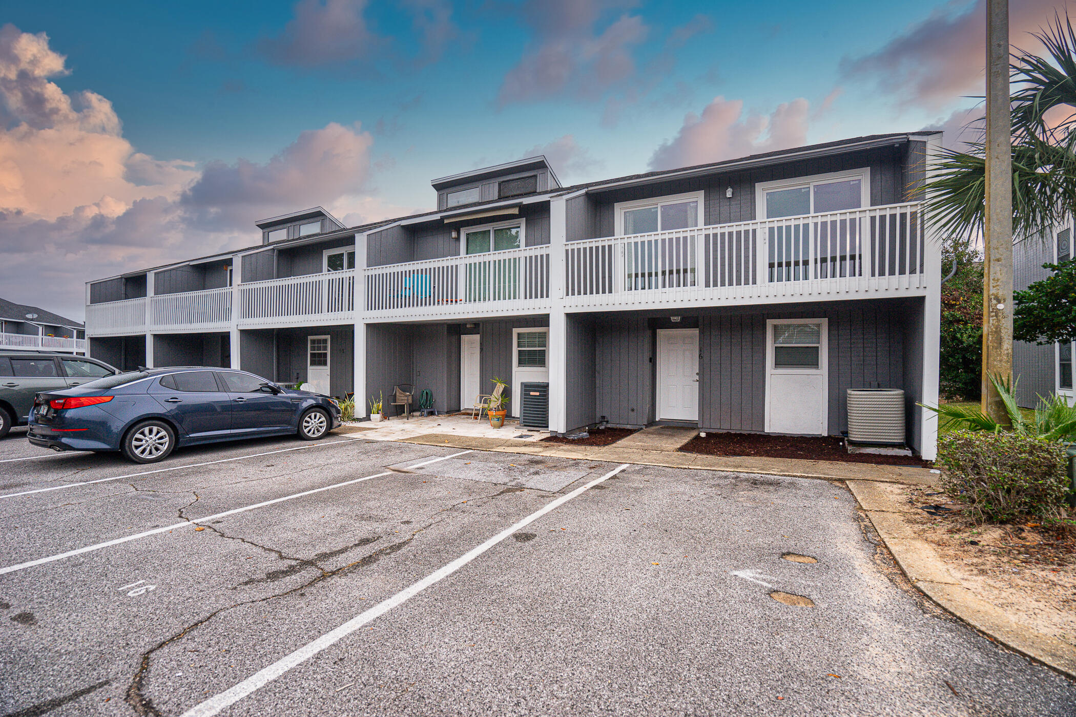16 Court Drive Destin, FL 32541 - Photo 2 of 50 a car parked in front of a building