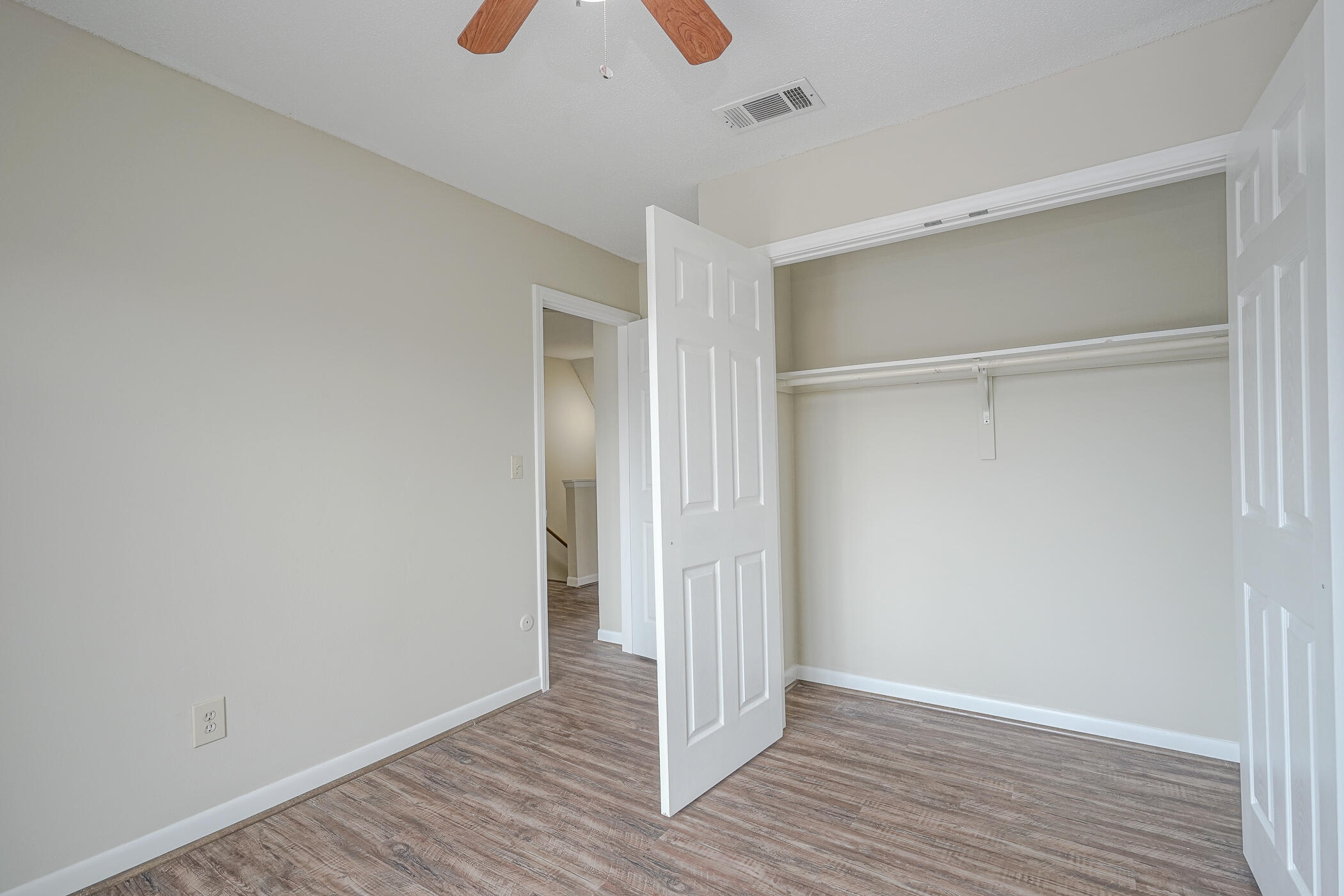 16 Court Drive Destin, FL 32541 - Photo 33 of 50 a view of an empty room with wooden floor