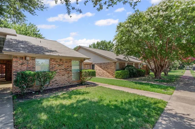 a view of a house with garden