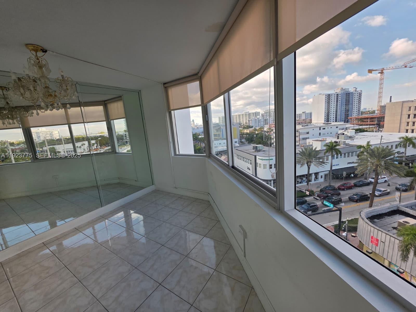 7135 Collins Avenue, Unit 725 Miami Beach, FL 33141 - Photo 5 of 21 a view of a city from a balcony