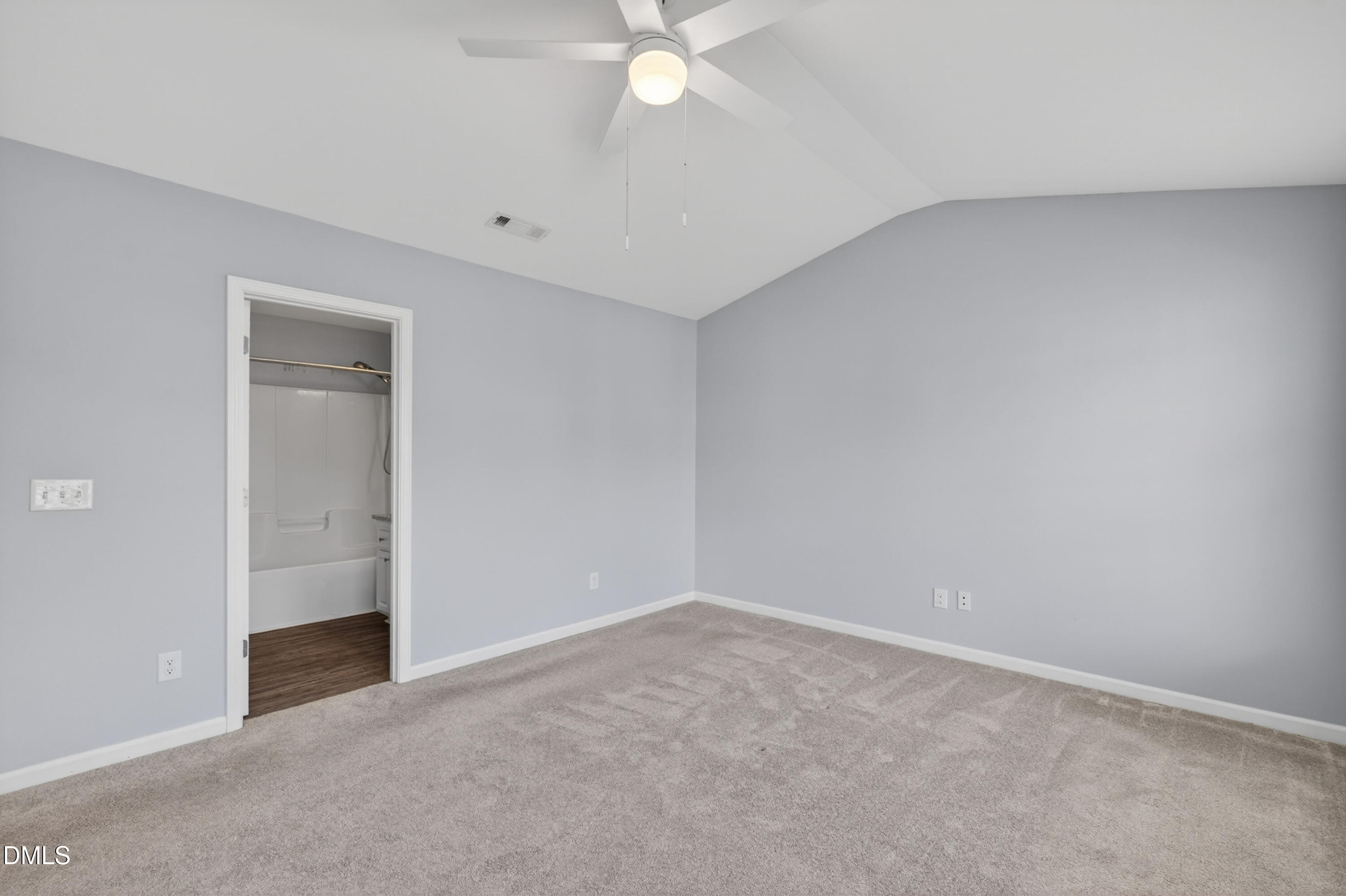 5421 Golden Arrow Lane Raleigh, NC 27613 - Photo 34 of 49 a view of an empty room with a ceiling fan