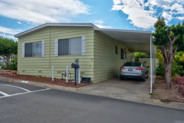 a house view with a backyard space