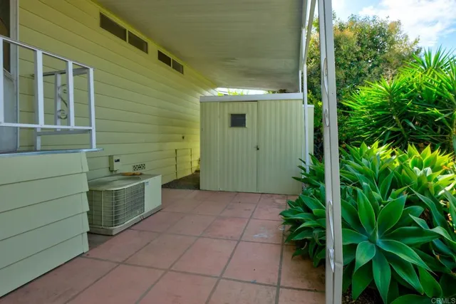 a view of a bathroom with a tub and a sink
