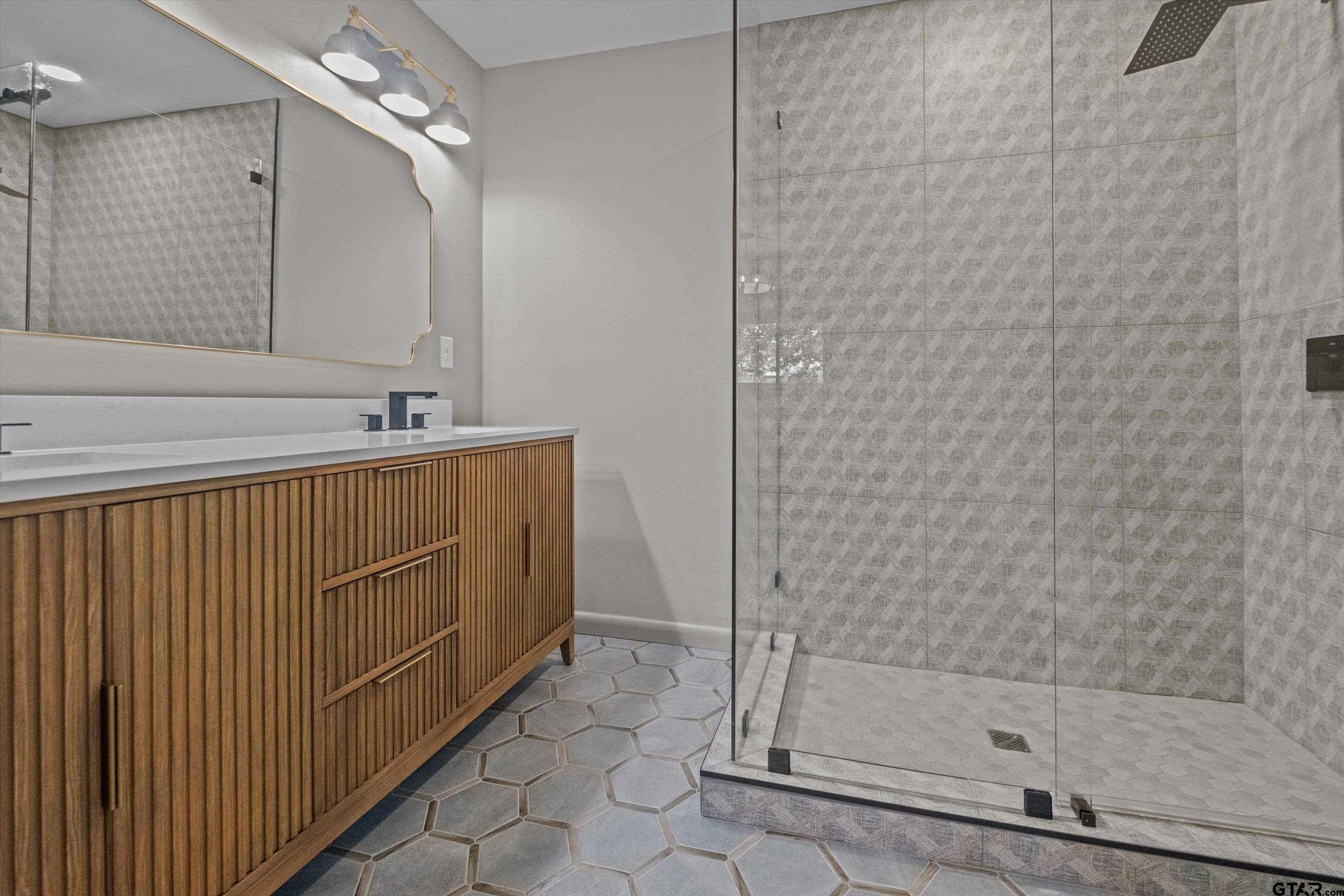 2515 Preston Avenue Tyler, TX 75701 - Photo 14 of 27 a bathroom with a shower