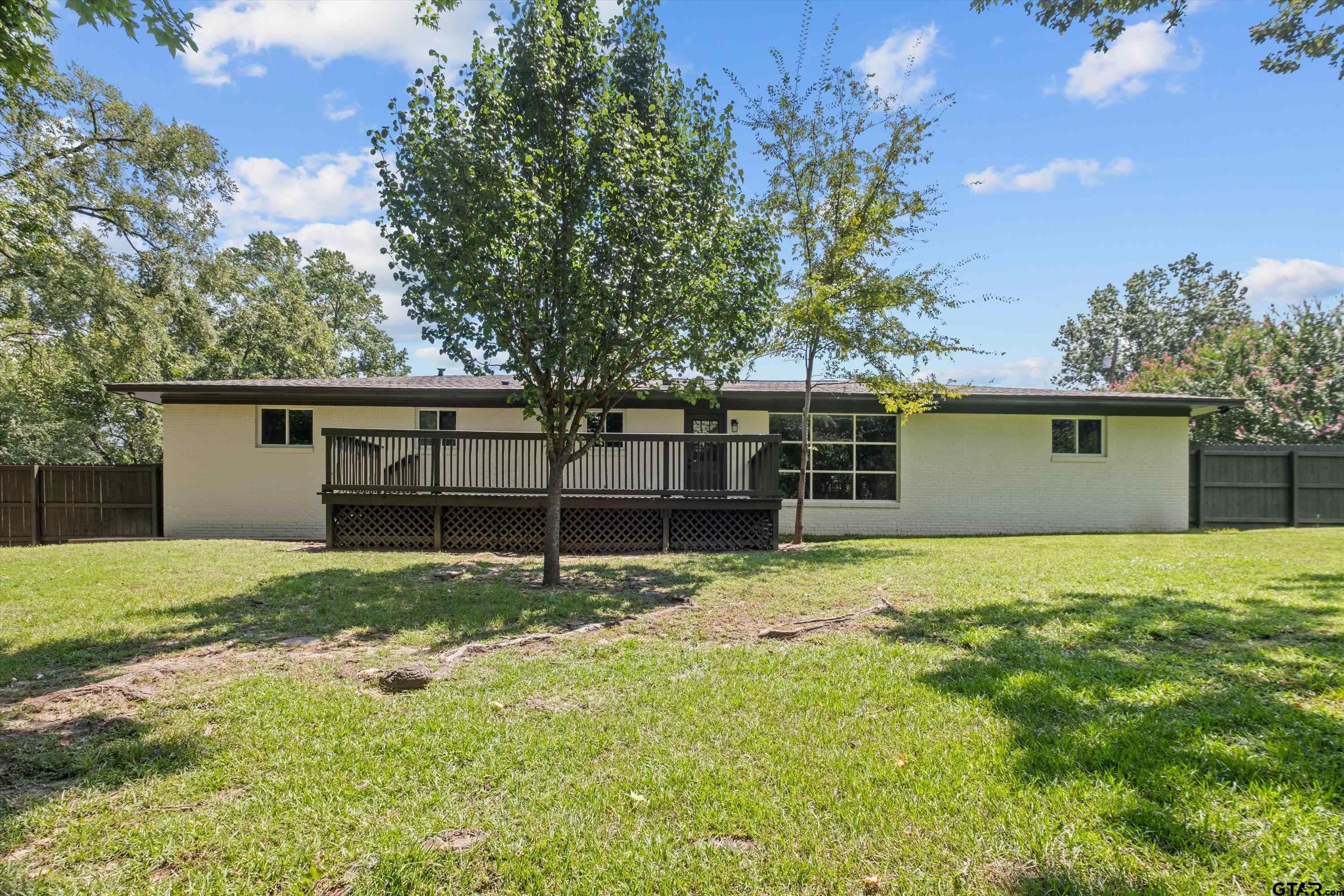 2515 Preston Avenue Tyler, TX 75701 - Photo 24 of 27 front view of a house with a yard