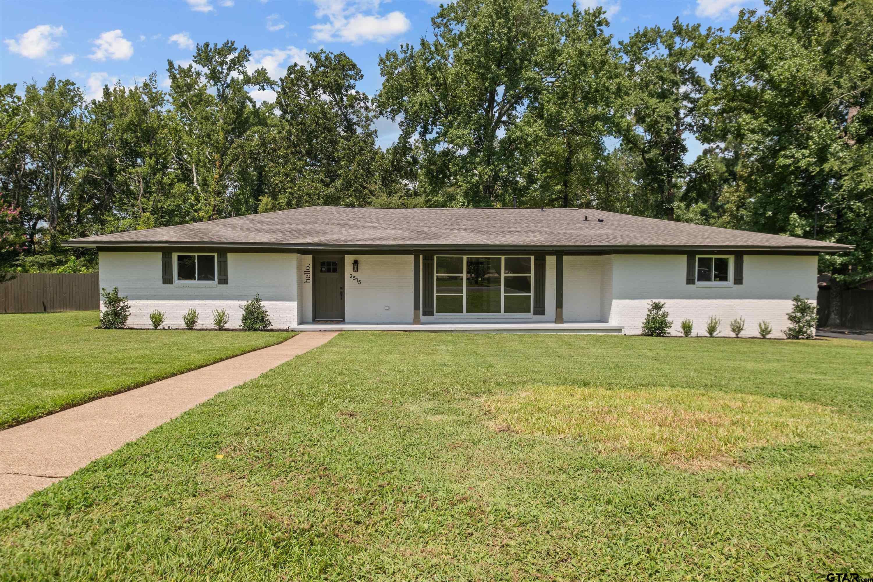 2515 Preston Avenue Tyler, TX 75701 - Photo 26 of 27 a front view of a house with a yard