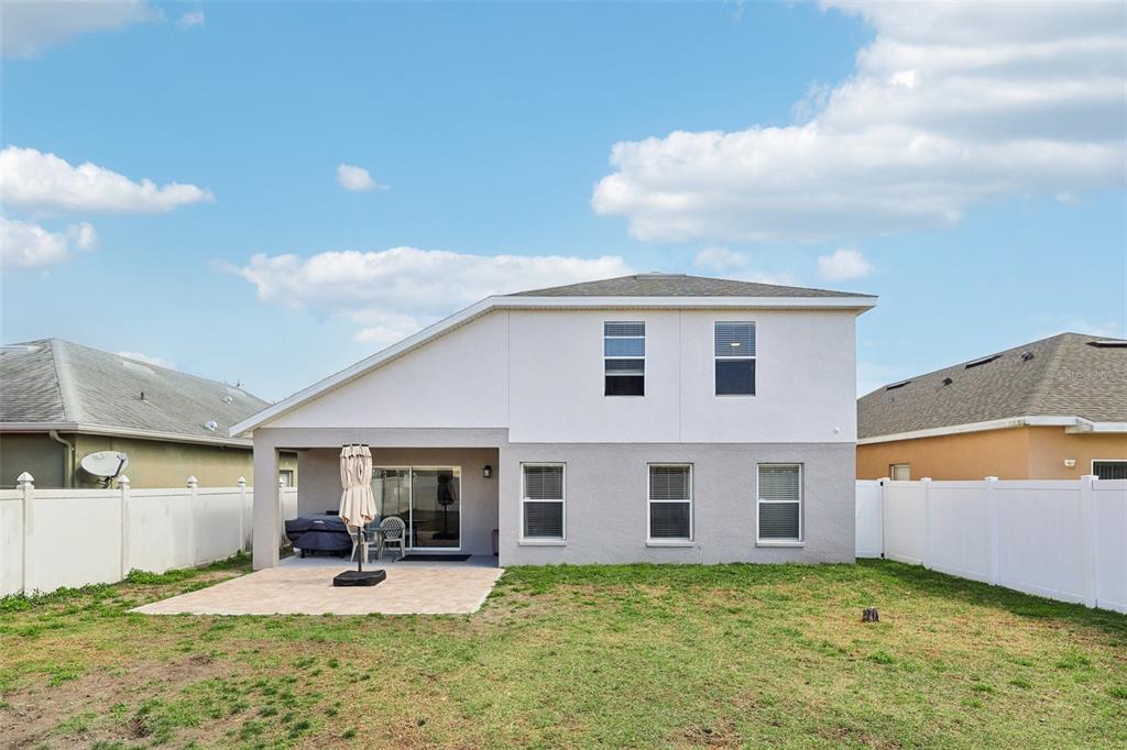 2104 Congress Lane St. Cloud, FL 34769 - Photo 40 of 71 a view of a house with yard and sitting area