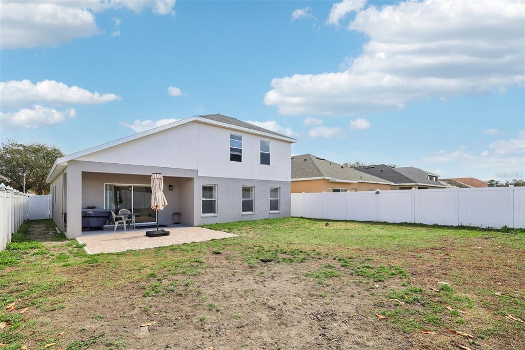 2104 Congress Lane St. Cloud, FL 34769 - Photo 41 of 71 a front view of house with yard and seating space