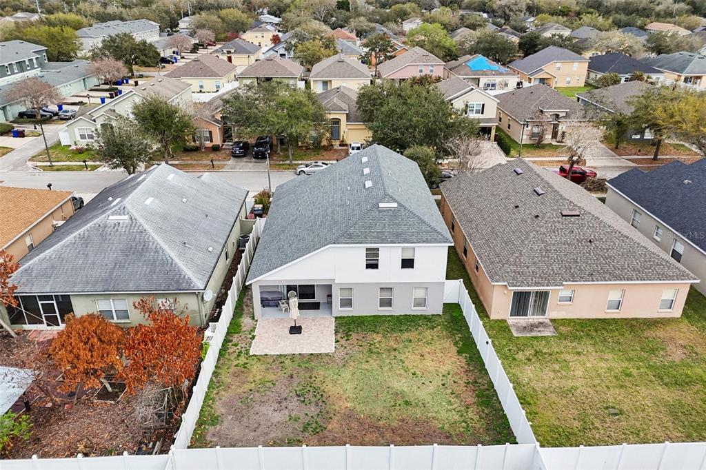 2104 Congress Lane St. Cloud, FL 34769 - Photo 46 of 71 an aerial view of residential houses with outdoor space