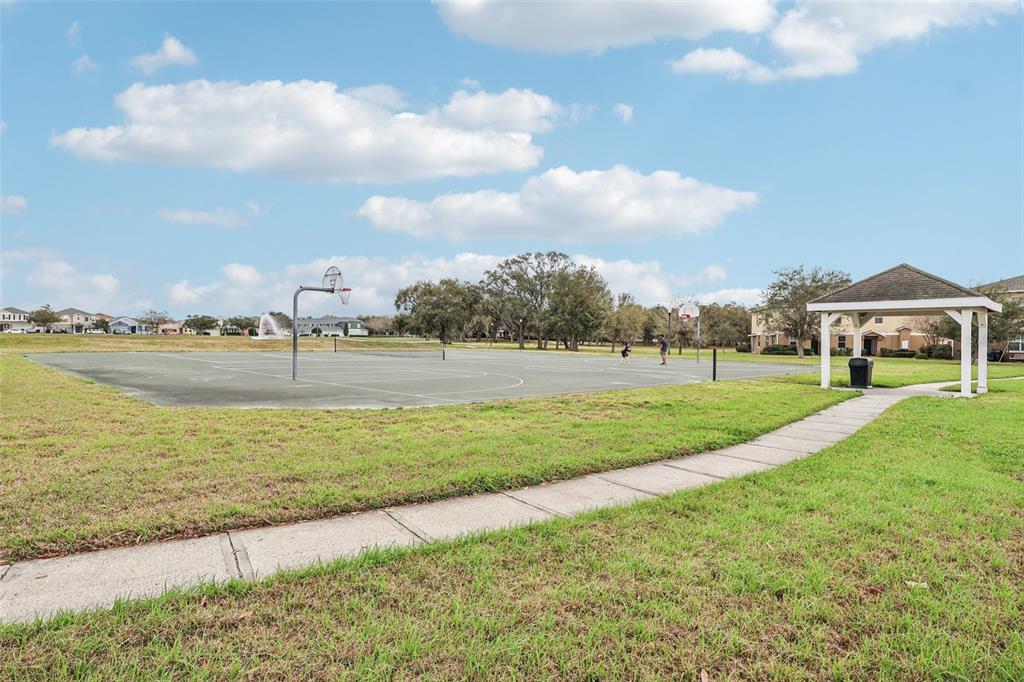 2104 Congress Lane St. Cloud, FL 34769 - Photo 60 of 71 a view of a house with a yard and lake view