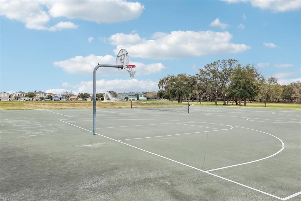 2104 Congress Lane St. Cloud, FL 34769 - Photo 61 of 71 a view of a tennis court