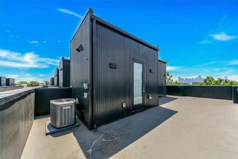 a view of a balcony with furniture