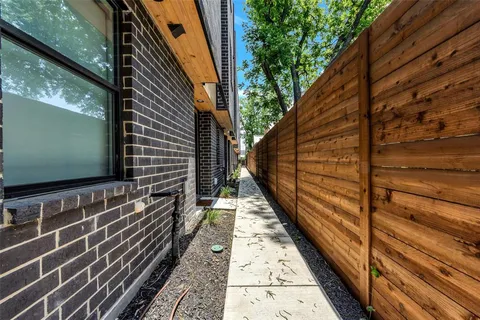 a view of balcony with wooden floor