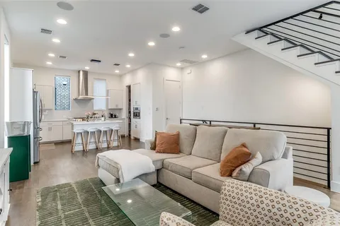 a living room with furniture and a table