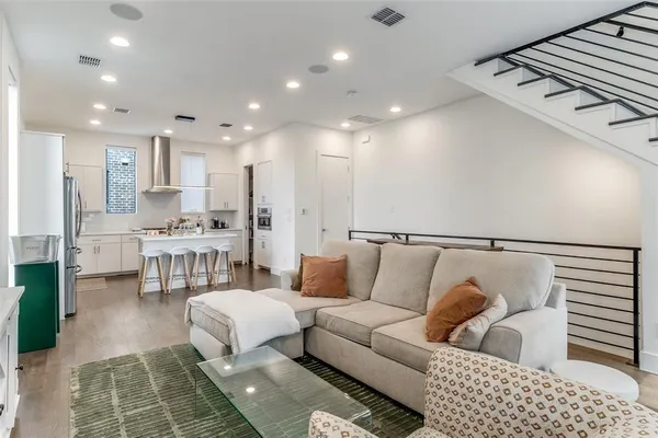 a living room with furniture and a table