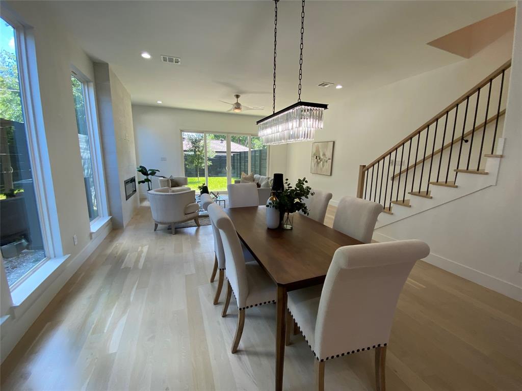 807 South Glasgow Drive Dallas, TX 75223 - Photo 7 of 25 a view of a dining room with furniture window and wooden floor